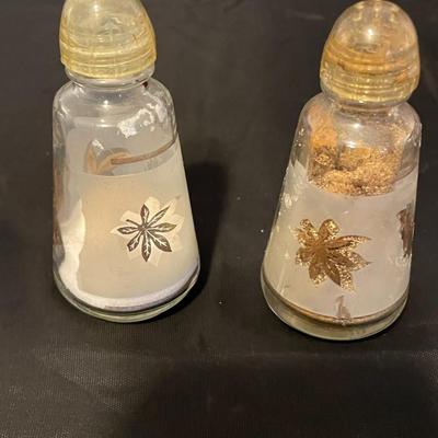 A COLLECTION OF SALT AND PEPPER SHAKERS