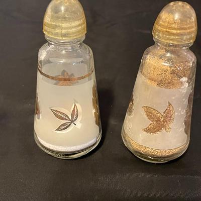 A COLLECTION OF SALT AND PEPPER SHAKERS