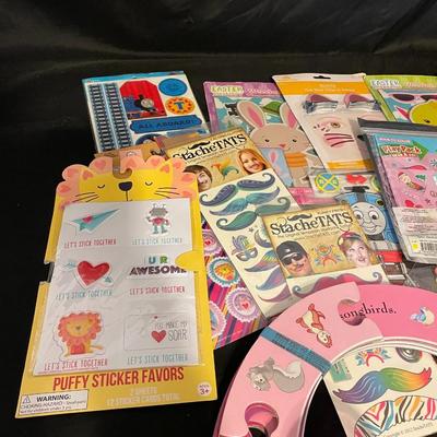 A VARIETY OF TOYS, STICKER AND MORE