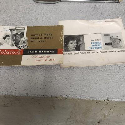 Sale Photo Thumbnail #487: Polaroid 800 in case with books and flash attachments. Fits large flat rate box