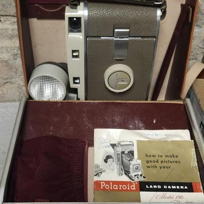 Sale Photo Thumbnail #489: Polaroid 800 in case with books and flash attachments. Fits large flat rate box