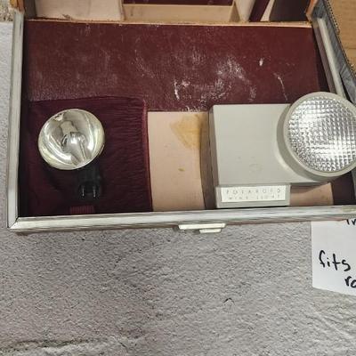 Sale Photo Thumbnail #488: Polaroid 800 in case with books and flash attachments. Fits large flat rate box