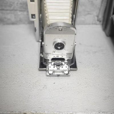 Sale Photo Thumbnail #478: Polaroid 800 in case with books and flash attachments. Fits large flat rate box