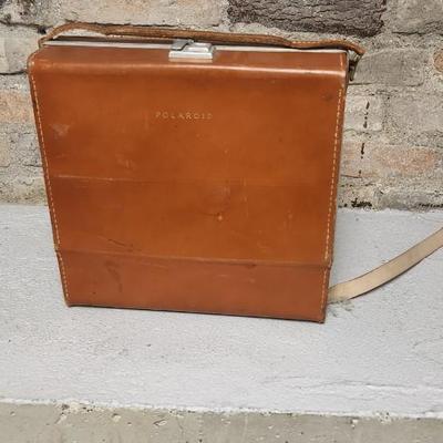 Sale Photo Thumbnail #490: Polaroid 800 in case with books and flash attachments. Fits large flat rate box