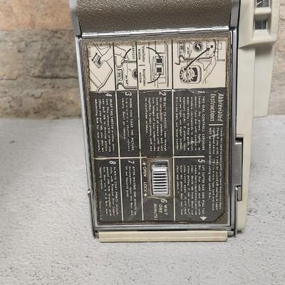 Sale Photo Thumbnail #482: Polaroid 800 in case with books and flash attachments. Fits large flat rate box