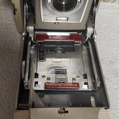 Sale Photo Thumbnail #505: Polaroid 850 Electric Eye Land Camera. Fits medium flat rate box