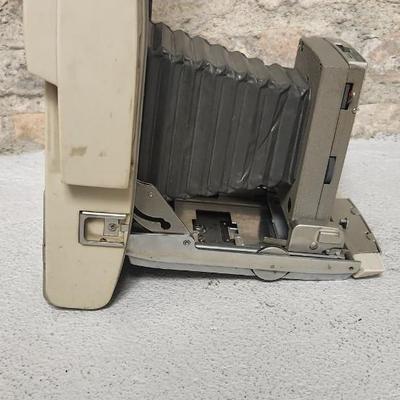 Sale Photo Thumbnail #501: Polaroid 850 Electric Eye Land Camera. Fits medium flat rate box