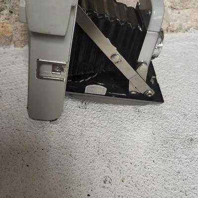 Sale Photo Thumbnail #518: Polaroid Model 80 in case with book, flash and bulbs. Fits large flat rate box