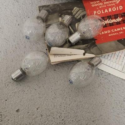 Sale Photo Thumbnail #524: Polaroid Model 80 in case with book, flash and bulbs. Fits large flat rate box