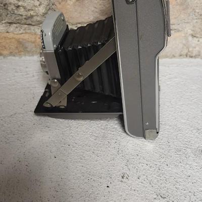 Sale Photo Thumbnail #520: Polaroid Model 80 in case with book, flash and bulbs. Fits large flat rate box