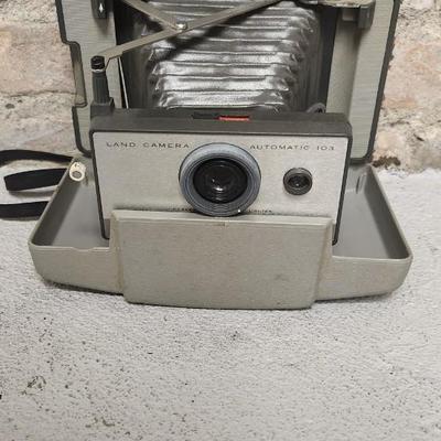 Sale Photo Thumbnail #541: Pair of Polaroid Land Cameras 103 and 104. Fits medium flat rate box
