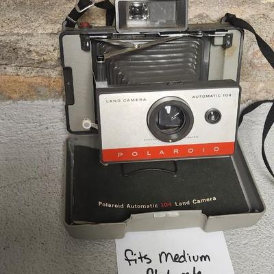 Sale Photo Thumbnail #554: Polaroid 104 with booklet. Fits medium flat rate box
