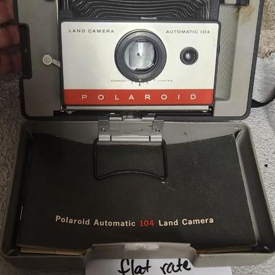 Sale Photo Thumbnail #553: Polaroid 104 with booklet. Fits medium flat rate box