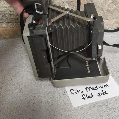 Sale Photo Thumbnail #555: Polaroid 104 with booklet. Fits medium flat rate box