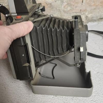 Sale Photo Thumbnail #568: Polaroid pair 104 and 220. Fits medium flat rate box