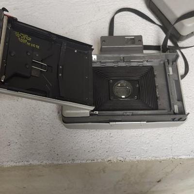 Sale Photo Thumbnail #565: Polaroid pair 104 and 220. Fits medium flat rate box