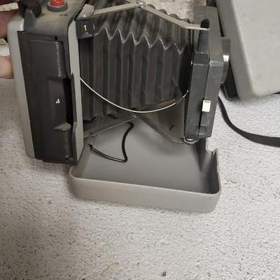 Sale Photo Thumbnail #562: Polaroid pair 104 and 220. Fits medium flat rate box