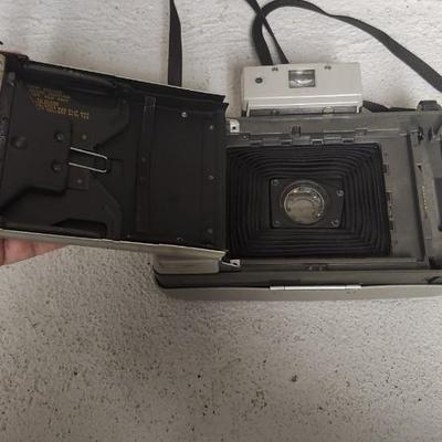 Sale Photo Thumbnail #571: Polaroid pair 104 and 220. Fits medium flat rate box