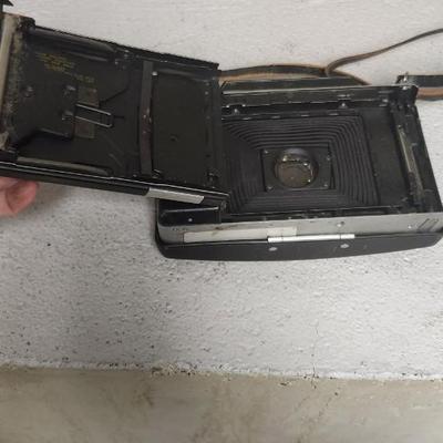 Sale Photo Thumbnail #593: Polaroid 360 with booklet. Fits medium flat rate box