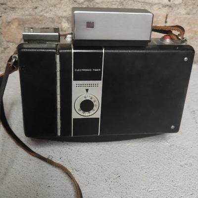 Sale Photo Thumbnail #591: Polaroid 360 with booklet. Fits medium flat rate box