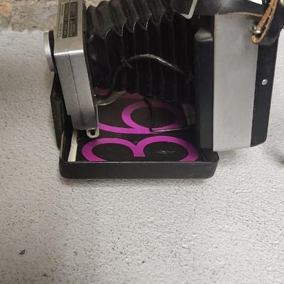 Sale Photo Thumbnail #592: Polaroid 360 with booklet. Fits medium flat rate box