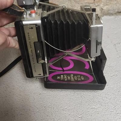 Sale Photo Thumbnail #590: Polaroid 360 with booklet. Fits medium flat rate box