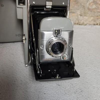 Sale Photo Thumbnail #610: Polaroid cameras. Three -J33 Model 80 and 103. Fits large flat rate box...medium is too snug to feel comfortable shipping them.