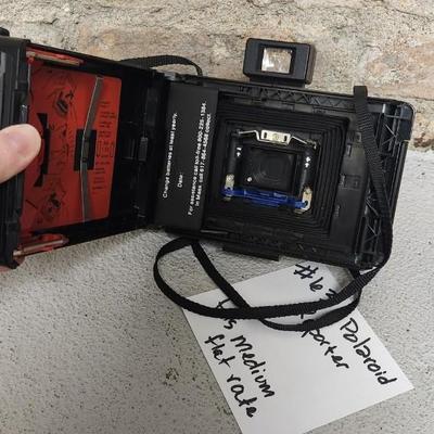 Sale Photo Thumbnail #623: Polaroid The Reporter. Fits medium flat rate box
