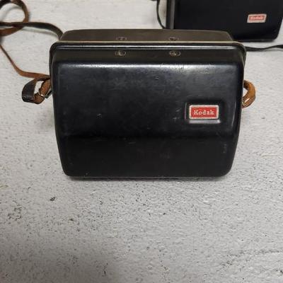 Sale Photo Thumbnail #637: Pair of Kodak Instamatic cameras. One 700 in case and one x-30 in case. The 700 has film in it. Fits medium flat rate box