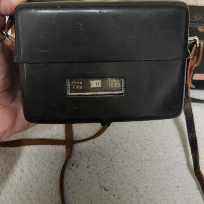 Sale Photo Thumbnail #641: Pair of Kodak Instamatic cameras. One 700 in case and one x-30 in case. The 700 has film in it. Fits medium flat rate box