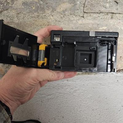 Sale Photo Thumbnail #648: Pair of Kodak Instamatic cameras. One 700 in case and one x-30 in case. The 700 has film in it. Fits medium flat rate box