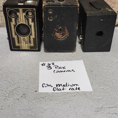 Sale Photo Thumbnail #660: 3 old box cameras. Fits medium flat rate box