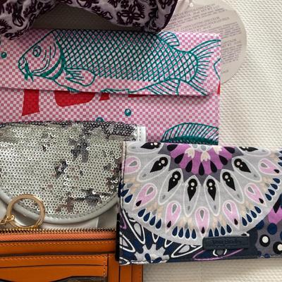 Sale Photo Thumbnail #282: Lot of various clutches, wallets, coin purses etc.  All clean and in new condition