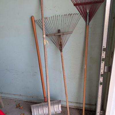Three rakes and a snow shovel