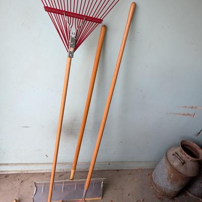 2 rakes and a snow shovel