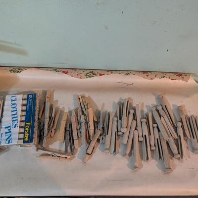 Old clothes pin bag and pins