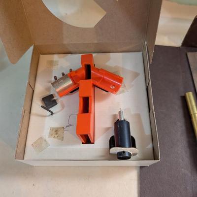 Chain saw sharpener, propane torch.