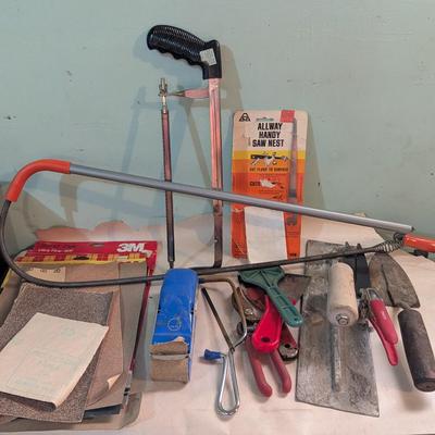 Saws, sandpaper, tools for putty work