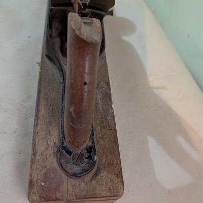 Vintage wood plane, carpentry tool.