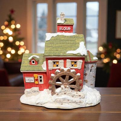 Sale Photo Thumbnail #370: Dept 56 Snow Village J Young's Granary Ceramic Figurine #5149-7  Approximately 9" x9" x 6"  Includes Light and cord.