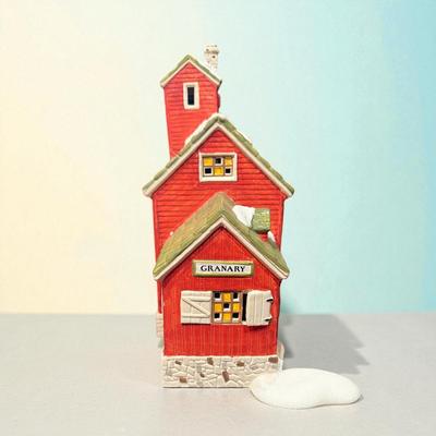 Sale Photo Thumbnail #367: Dept 56 Snow Village J Young's Granary Ceramic Figurine #5149-7  Approximately 9" x9" x 6"  Includes Light and cord.