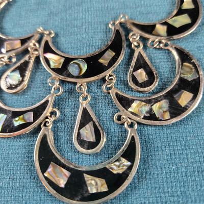 Sale Photo Thumbnail #465: This auction lot is for a Vintage Mexican Alpaca Silver Necklace and Earrings Set. This is a beautiful Vintage Mexican Alpaca Silver Necklace and Earrings inlaid with Abalone Shell.  It is about 8-inches long and in very good shape.
