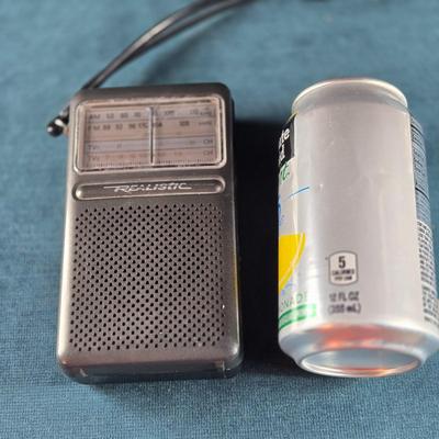 Sale Photo Thumbnail #471: This auction lot is for a Vintage Realistic #12 Transistor Radio. This is a working Vintage Realistic #12 Transistor Radio.  Just put in a new battery and it works!  It is in good used condition.