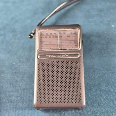 Sale Photo Thumbnail #470: This auction lot is for a Vintage Realistic #12 Transistor Radio. This is a working Vintage Realistic #12 Transistor Radio.  Just put in a new battery and it works!  It is in good used condition.