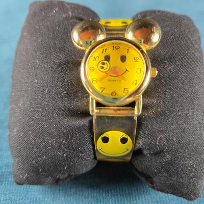 Sale Photo Thumbnail #479: This auction lot is for a Rare Vintage Smiley Face Watch with Mickey Mouse Ears. This watch is a Vintage Smiley Face Quartz Watch with a new battery installed by Jarrod Jewelers on 11/22/25.  It's running great!  The second hand is a smiley face that rota