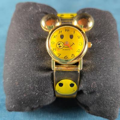 Sale Photo Thumbnail #478: This auction lot is for a Rare Vintage Smiley Face Watch with Mickey Mouse Ears. This watch is a Vintage Smiley Face Quartz Watch with a new battery installed by Jarrod Jewelers on 11/22/25.  It's running great!  The second hand is a smiley face that rota