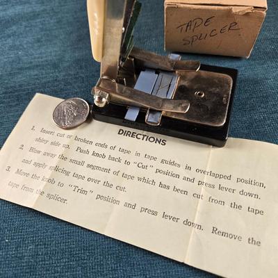 Sale Photo Thumbnail #503: This auction lot is for a Vintage Reel to Reel Audio Tape Splicer. This is a Vintage Reel to Reel Audio Tape Splicer that can still be used.  It is marked made in Japan on its box.  It is used to precisely cut and join magnetic tape - specifically audio. 