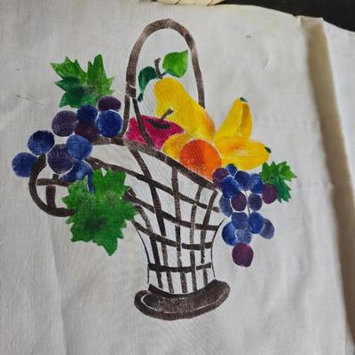 A Fruitful Display - Fruit themed lidded cookie jar - Brass wall plate - Wooden fruit bushel baskets = and a table runner with a fruit...