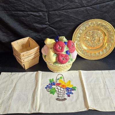 A Fruitful Display - Fruit themed lidded cookie jar - Brass wall plate - Wooden fruit bushel baskets = and a table runner with a fruit...