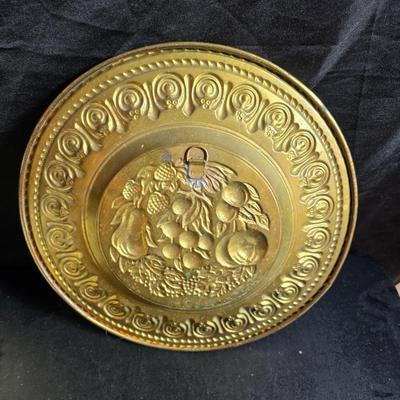 A Fruitful Display - Fruit themed lidded cookie jar - Brass wall plate - Wooden fruit bushel baskets = and a table runner with a fruit...